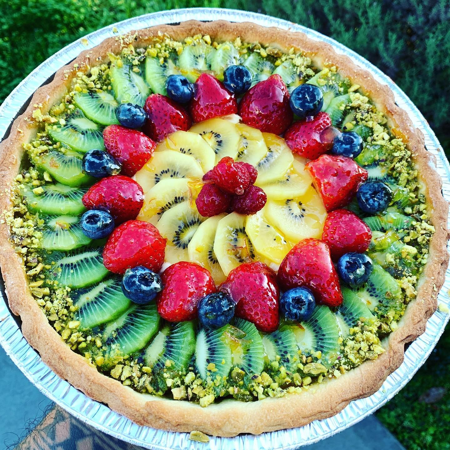 Fresh fruit tart with kiwi, strawberries and berries
