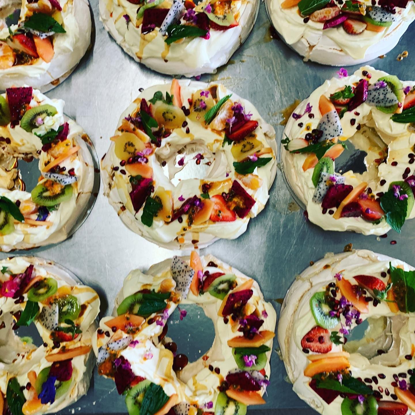 Petite tarts garnished with edible flowers